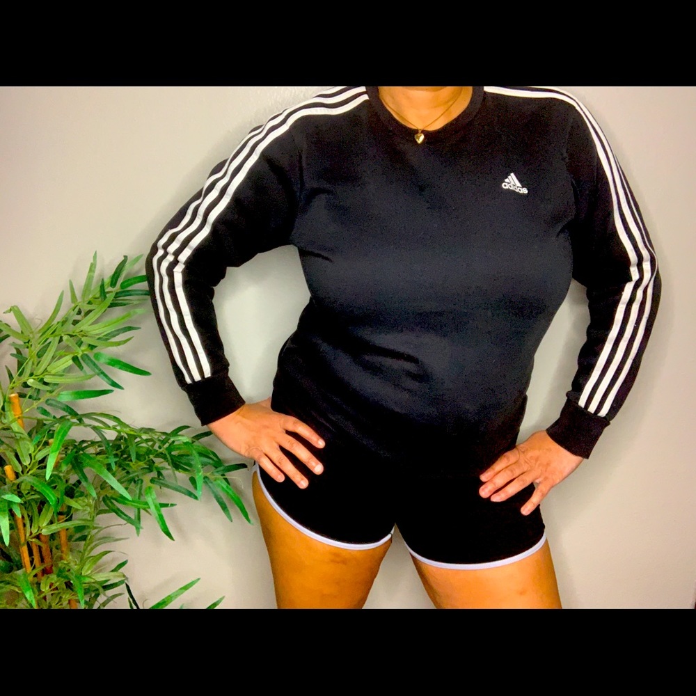 Long sleeve Addidas pull over sweatshirt .